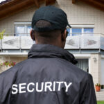 security guard in front of home